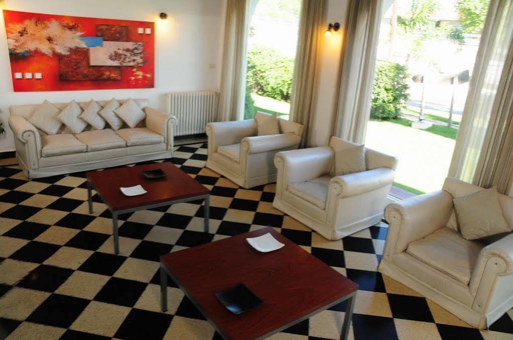 Hostal De La Costa Вилья-Карлос-Пас Экстерьер фото